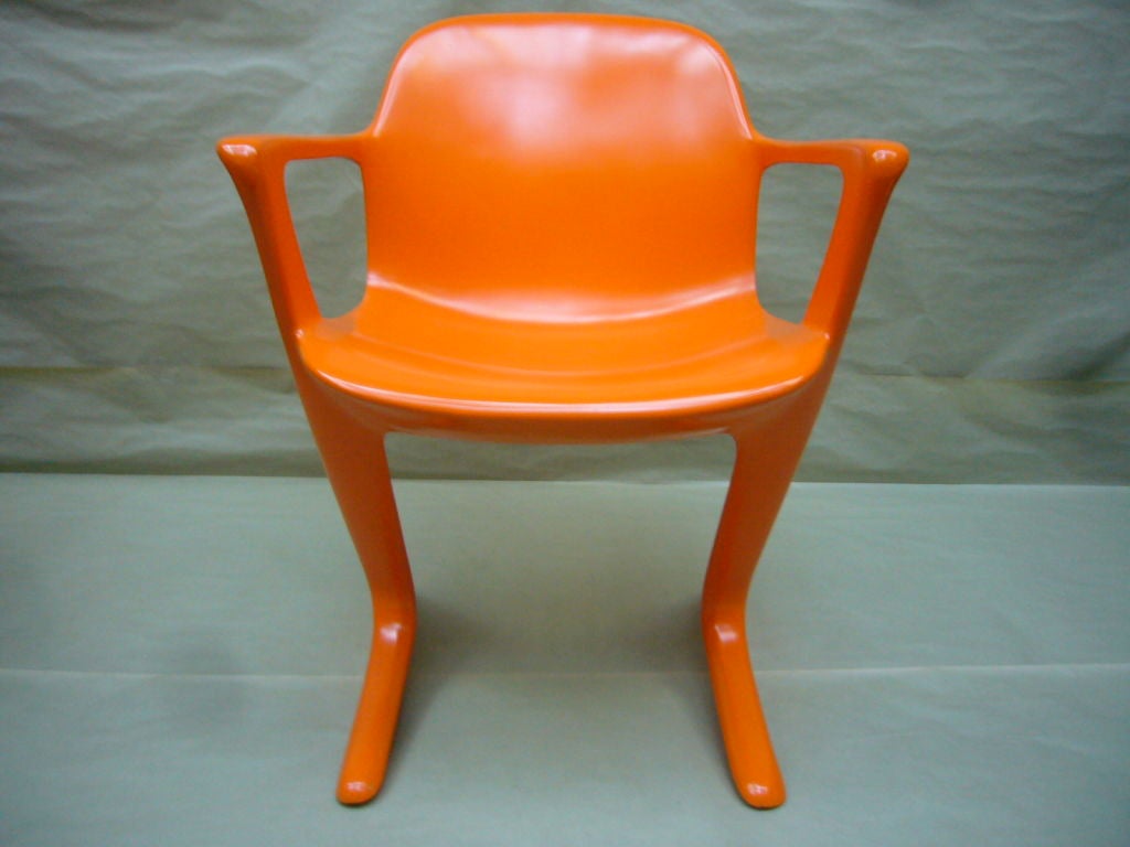 Pair of Orange 'Kangaroo' Arm Chairs by Ernst Moeckl 1