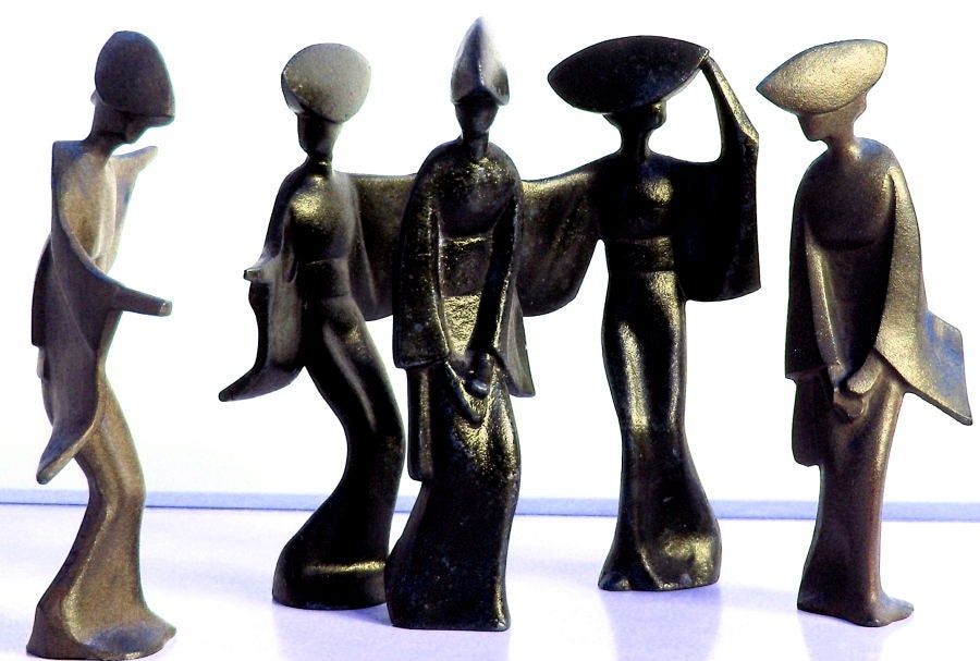Set of five intriguing cast iron figures of Geisha dancers will add a playful accent to your James Mont inspired interiors.