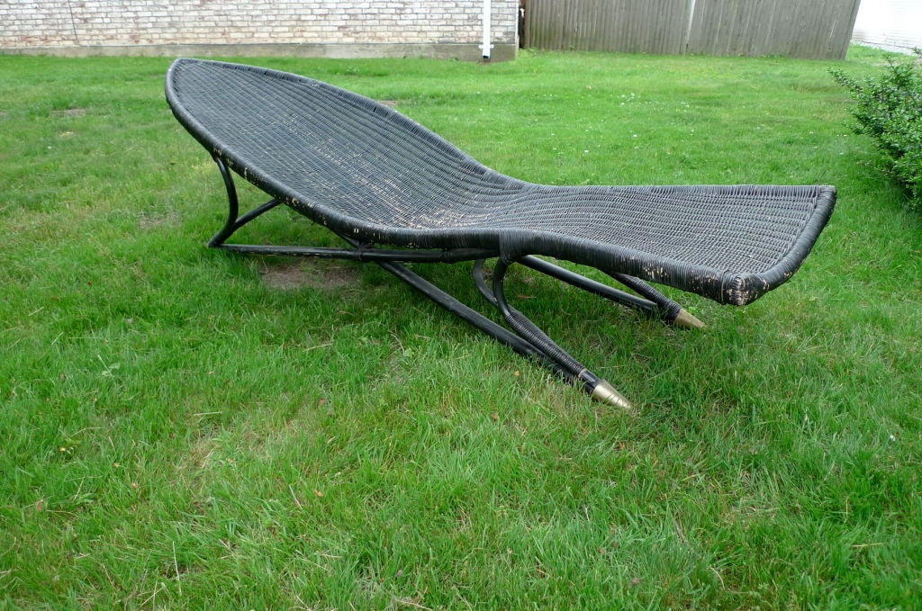Unusual and striking painted mid-century wicker chaise in shape of a fish. Very comfortable and robust bamboo frame. Extremely well made. Brass feet caps. Metal label: Tropic Cane - Hong Kong.