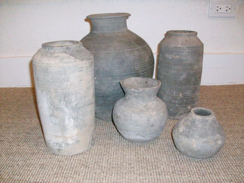 Gorgeous five piece collection of ancient Chinese pottery vessels from the Han Dynasty period.