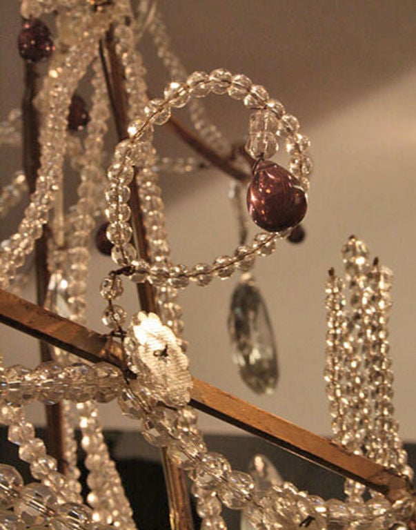 A whimsical Italian Tole and crystal chandelier in a Pagoda design.