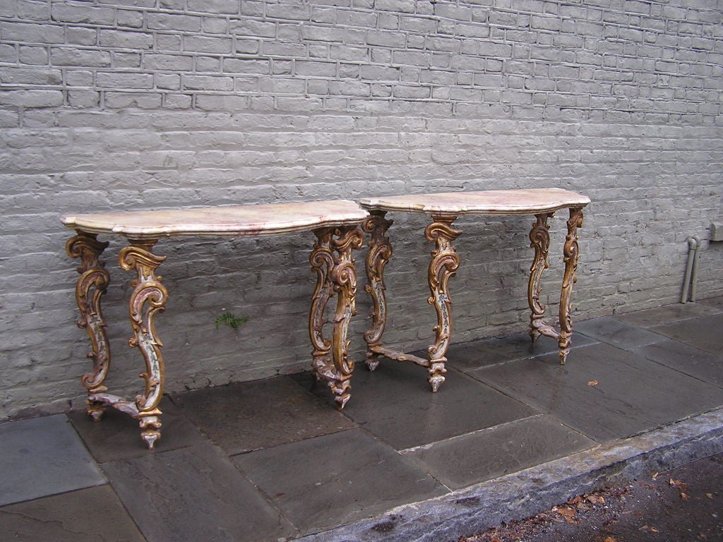 Pair of Venetian Poly Chromed Faux Marble Consoles. Circa 1780