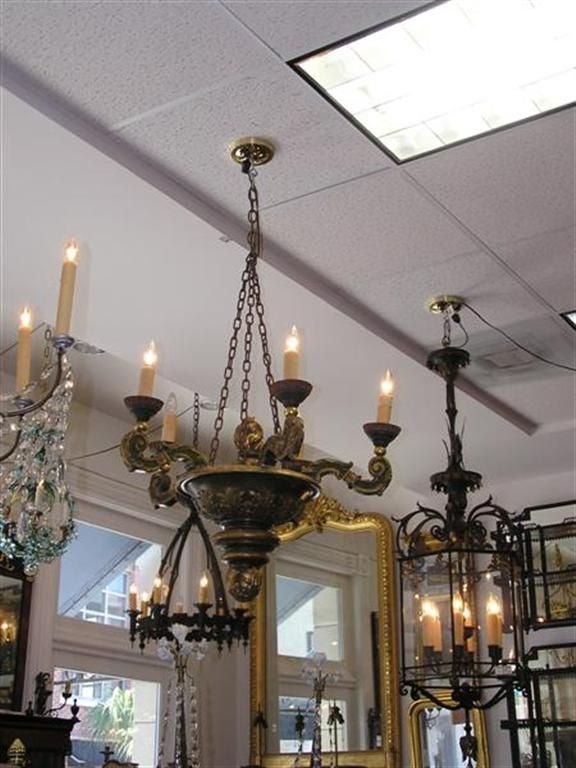 Italian painted and gilt carved wood five arm chandelier with floral motif. Originally candle powered.