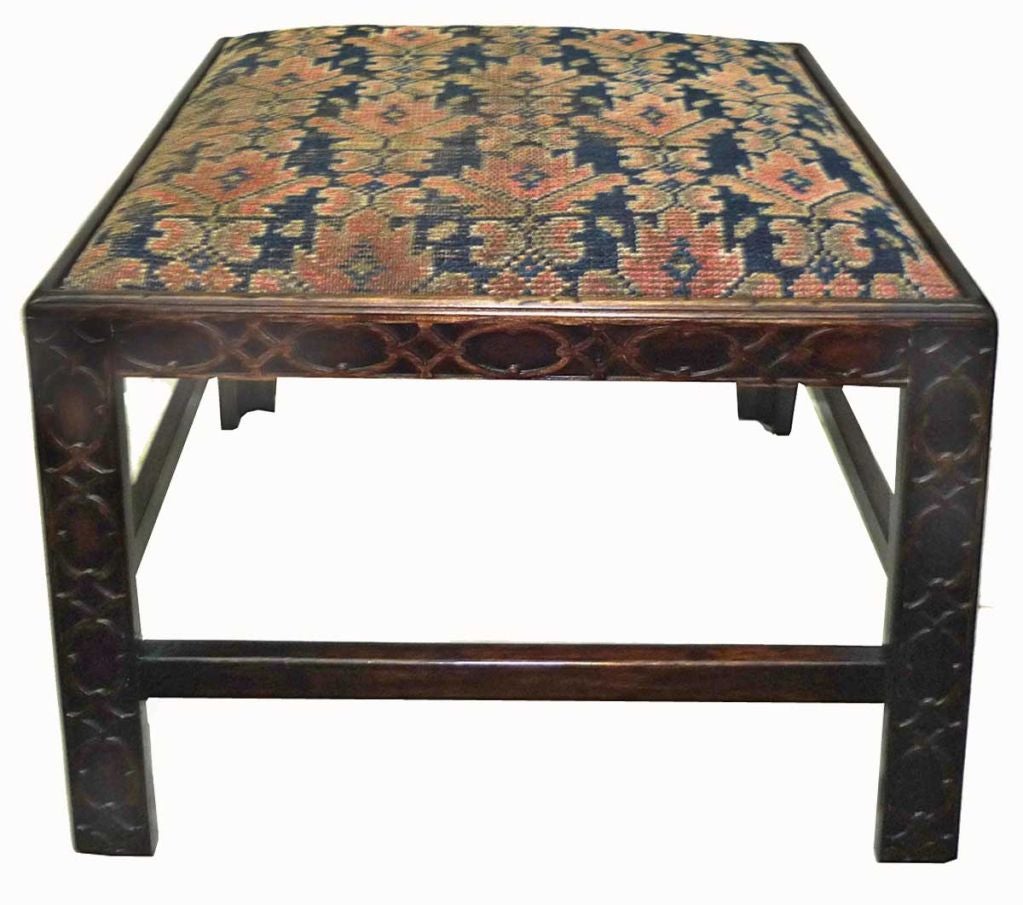 Pair of Bench Made Chinese Chippendale Foot Stools; the slip seat upholstered with a 19th Century Anatolian Rug Fragment; raised on blind fret marlboro legs connected with stretchers.  www.TraceMayer.com