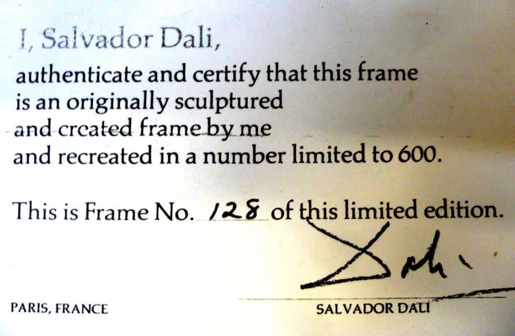 Salvador Dali Cast and Gilded Mirror, 20th Century; along with a certificate identifying this as #128 in a limited edition. www.TraceMayer.com