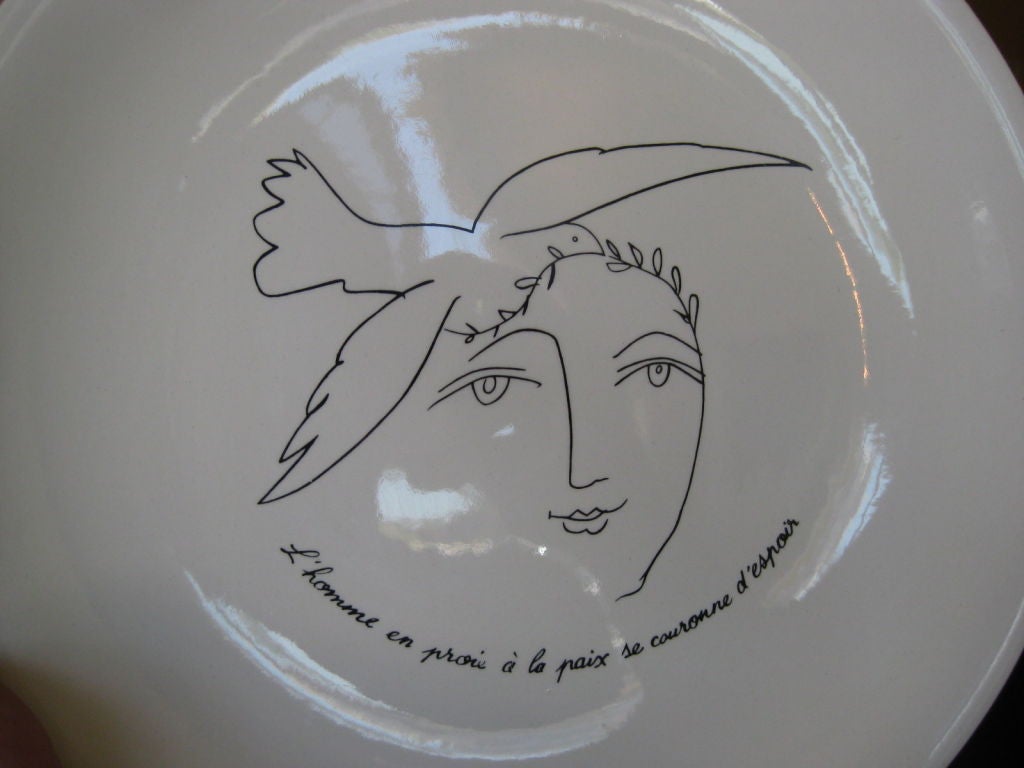 Very rare plate designed by Picasso with the text of Paul Eluard. Titled 