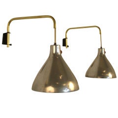 Pair of Swing Arm Wall Sconces by Koch Lowy