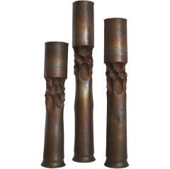 Set of Three Tortured Copper Candlesticks