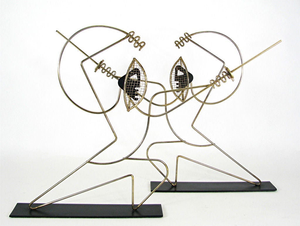 Pair of table sculptures depicting two fencers by Frederick Weinberg, ca. 1950s.     Wirework with gold wash, black enameled faces with screen masks.   Rare table-top version of Weinberg’s fencing series.