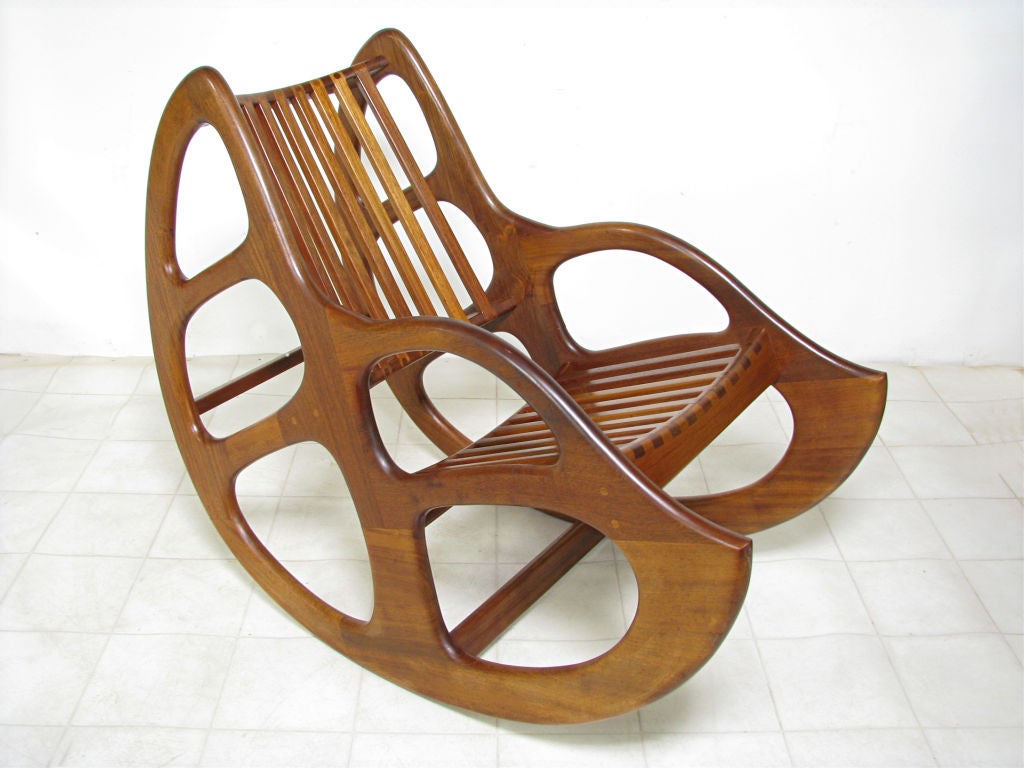 Impressive hand made studio rocking chair, California made, in the tradition of Sam Maloof.     Perfect balance, comfortable seat and back, and meticulous exposed joinery.   A joy to sit in and behold.   Maker unknown, though, anecdotally, this