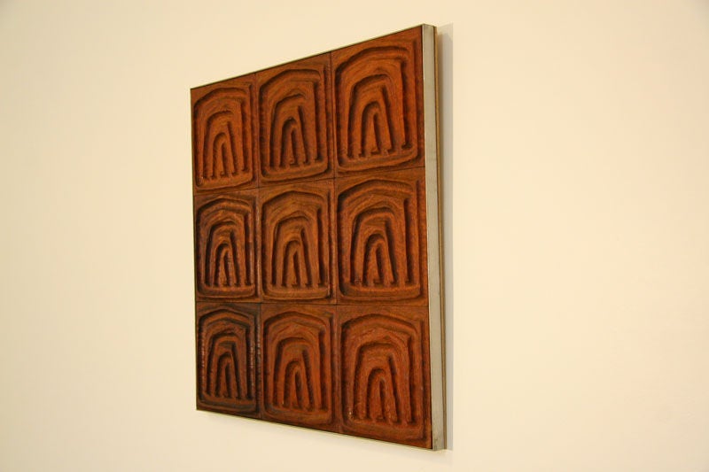 This panel is constructed of vintage Forms and Surfaces redwood tiles.  The frame is made of brushed stainless steel.  Redwood pieces have been oiled with a penetrating redwood oil.  This type of finish leaves the wood feeling like wood.

Many