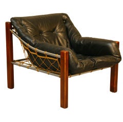 Leather, chrome and rope lounge chair by Jean Gillon