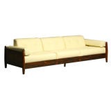 Brazilian Rosewood and cream leather sofa