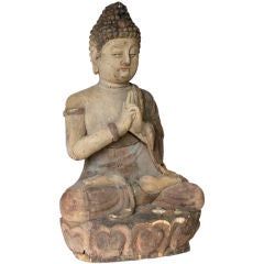 Carved wood and painted Buddha