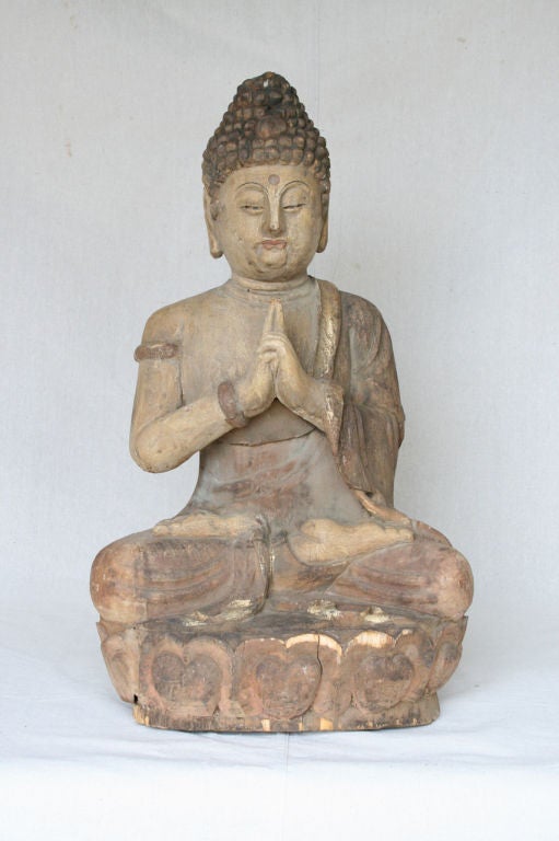 Carved wood and painted Buddha