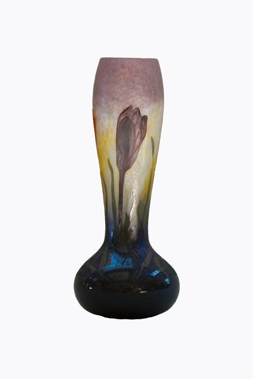 rench Art Nouveau padded & wheel-carved “Crocus” vase by, Daum Nancy decorated crocus flowers with the first having deep purple crocus flower, the second and third groupings with orange crocus flowers against a purple to yellow mottled background