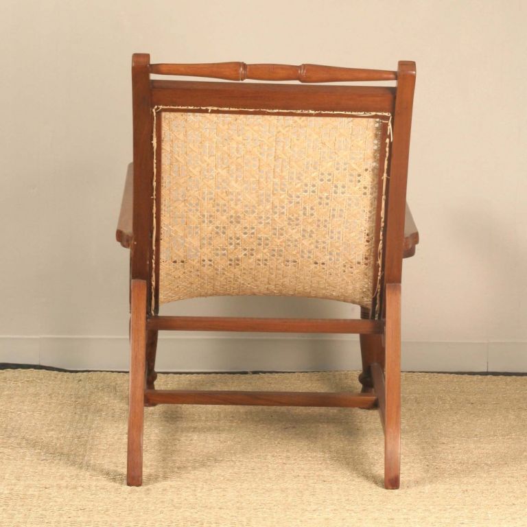 Anglo-Indian Teak Planters Chair with Sliding Footrest Arms 1