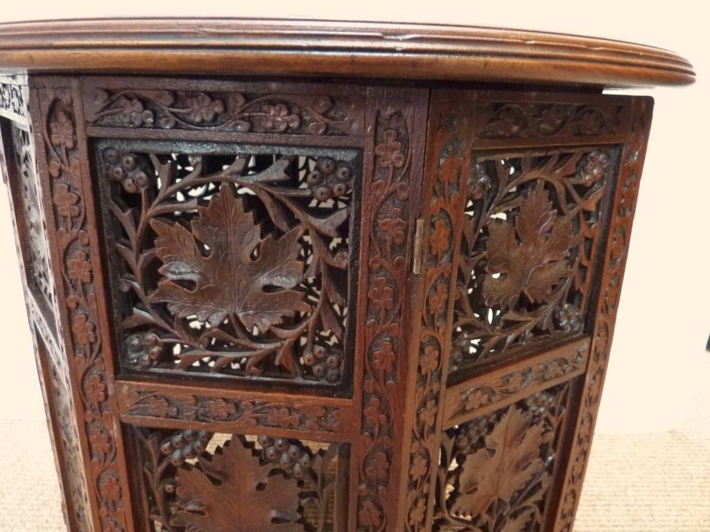 Anglo-Indian Heavily Carved Rosewood Table with Folding Base 1