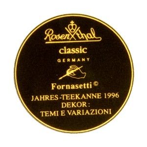 Manufactured by Rosenthal. Printed to underside: marker’s mark and “Fornasetti/Jahres-Teekanne 1996”