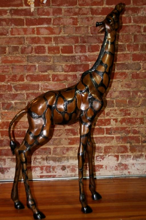 Pair of Maitland Smith Dark Bronze Patina Giraffes In Excellent Condition In Asheville, NC