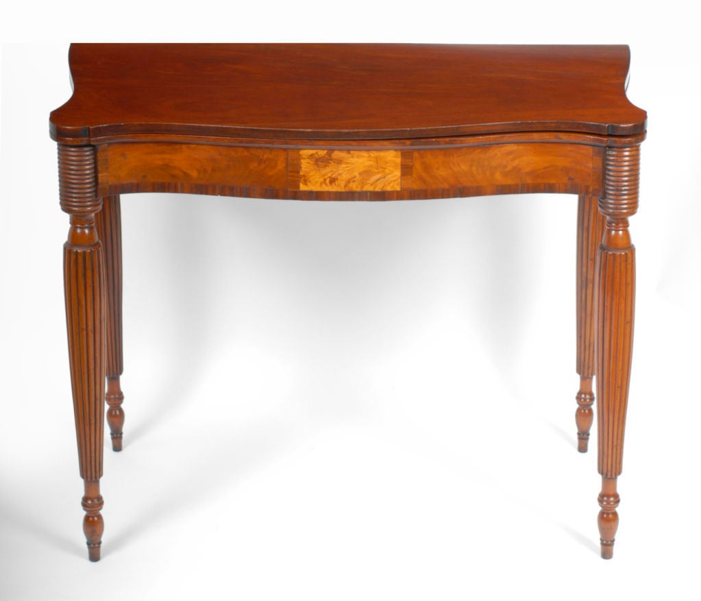 A Sheraton Mahogany and Inlaid Games Table