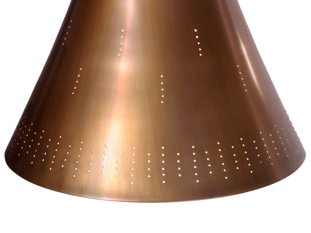 An elegantly cinched cone brass shade with a solid brass sphere counterweight.