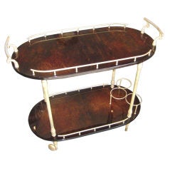 A vintage Aldo Tura bar cart circa 1950's