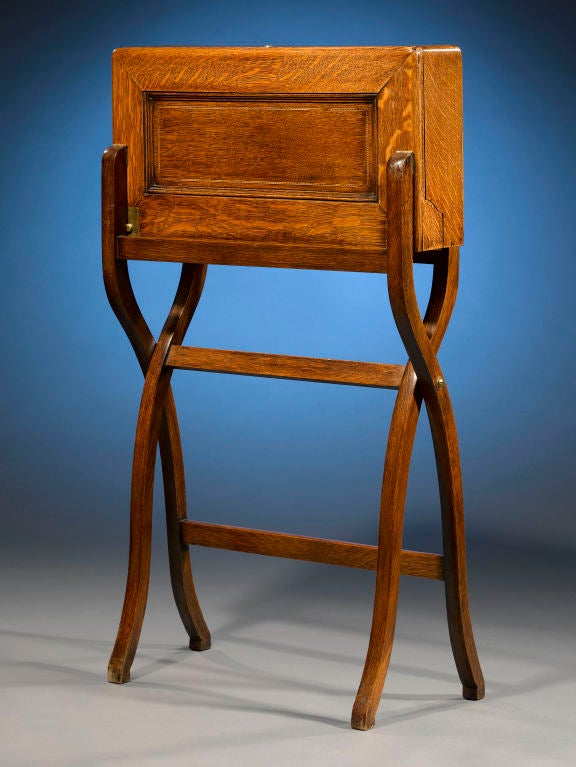 This excellent traveling camp desk once belonged to Henry Morton Stanley, perhaps the most famed explorer of the 19th century. Beautifully crafted of oak and appointed with a leather and fabric interior, the desk opens with the push of two buttons