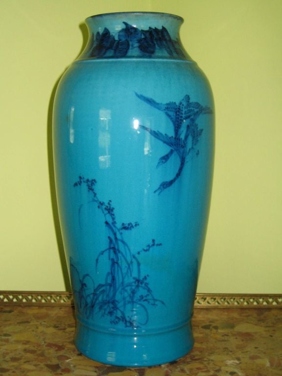 JAPANESE KOSHISHI SIGNED STUDIO VASE IN TURQUOISE WITH ALL THE DECORATION IN UNDERGLAZE COBALT BLUE. IT IS CLEARLY MARKED ON THE BOTTOM OF THE VASE.