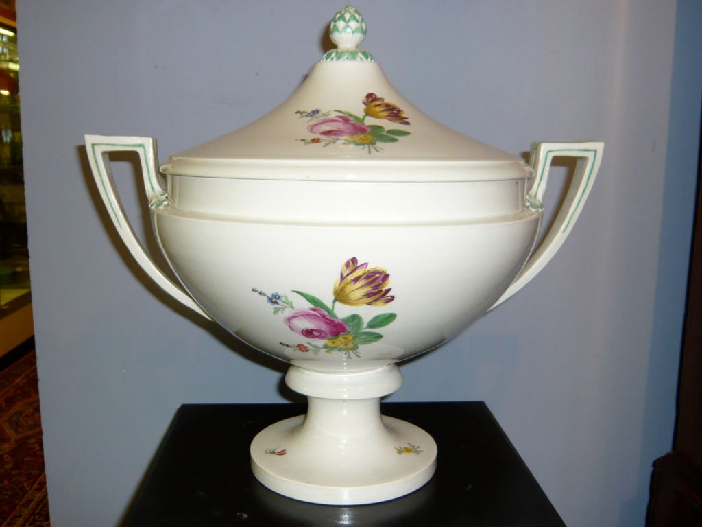 A large, simple, handpainted tureen by the Royal Vienna Porcelain factory featuring restrained use of floral decoration of exceptional quality and detail.  Marked.  Wonderful overall form, handles and finial.  Great scale and size for a large