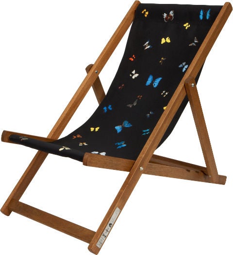 This deck chair by the British artist Damien Hirst is available in six colors, all with differing layouts:<br />
<br />
  blue<br />
  black<br />
  red<br />
  orange<br />
  yellow<br />
  lime green<br />
<br />
Each chair bears a