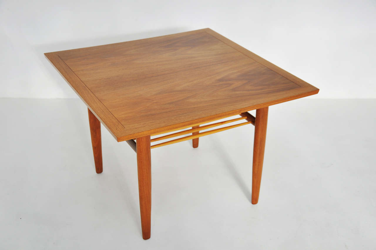 Sundra line side tables by George Nakashima for Widdicomb.  Walnut table with hickory spindles.