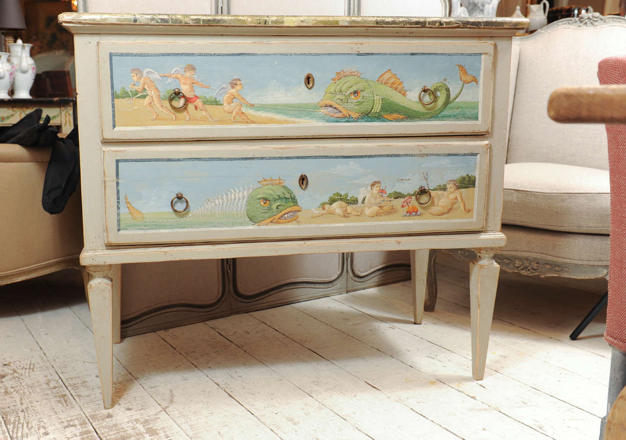 Decorative painted Italian chest of drawers.
Top is marble painted.