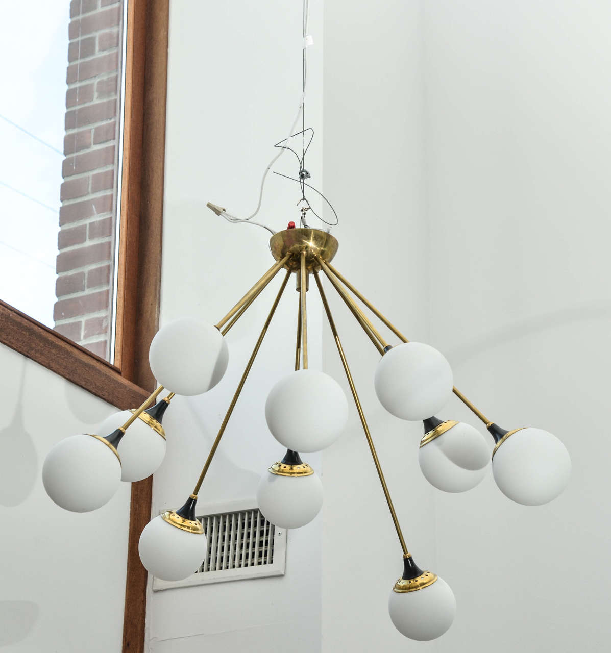 Italian brass chandelier.
Ten brass arms ending with handblown glass shades,
Fully restored.