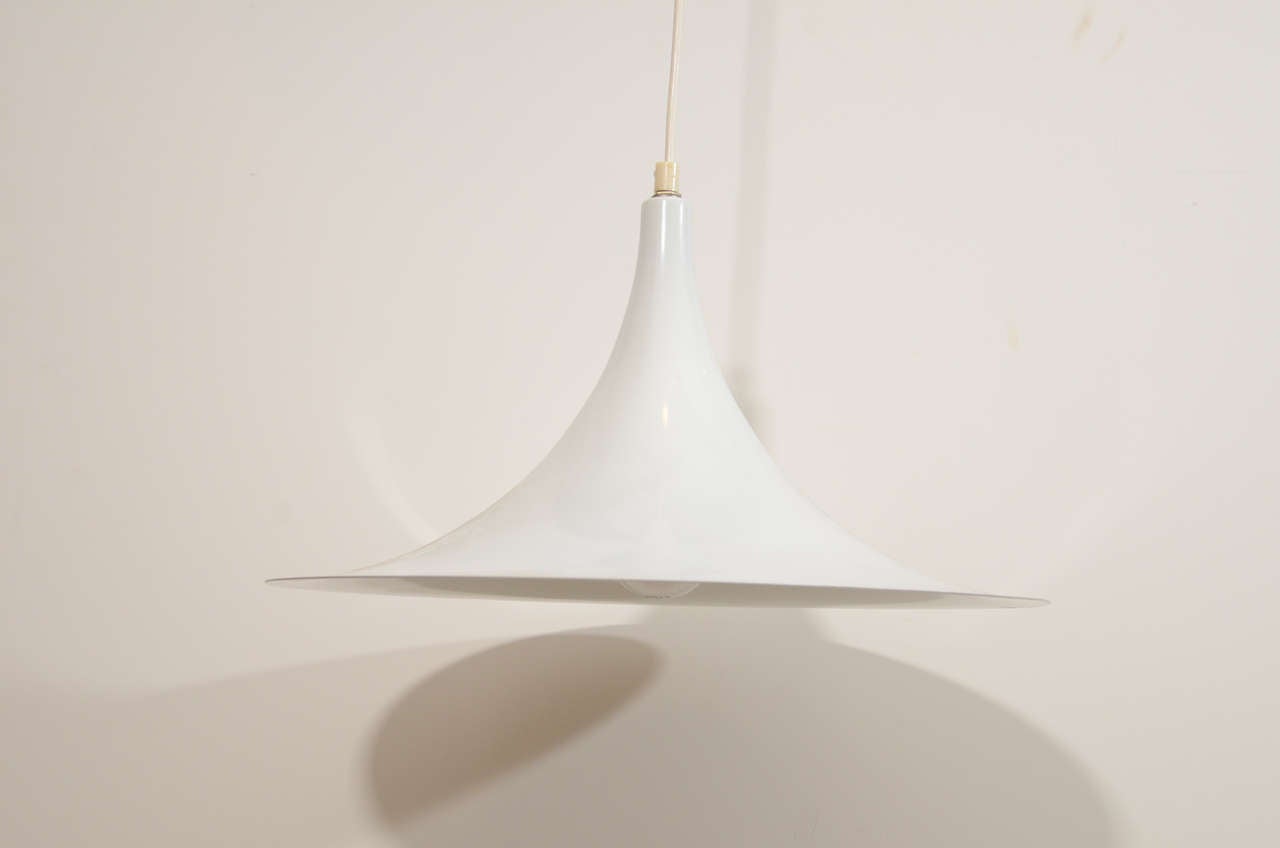 Vintage 1960s Gobi White Semi Pendant Lamps

This pair of Vintage Hanging Lamps from Denmark are in like-new condition. The bulb is a standard but being so small can only take 40 watts with a regular incandescent light bulb, but if you were to get