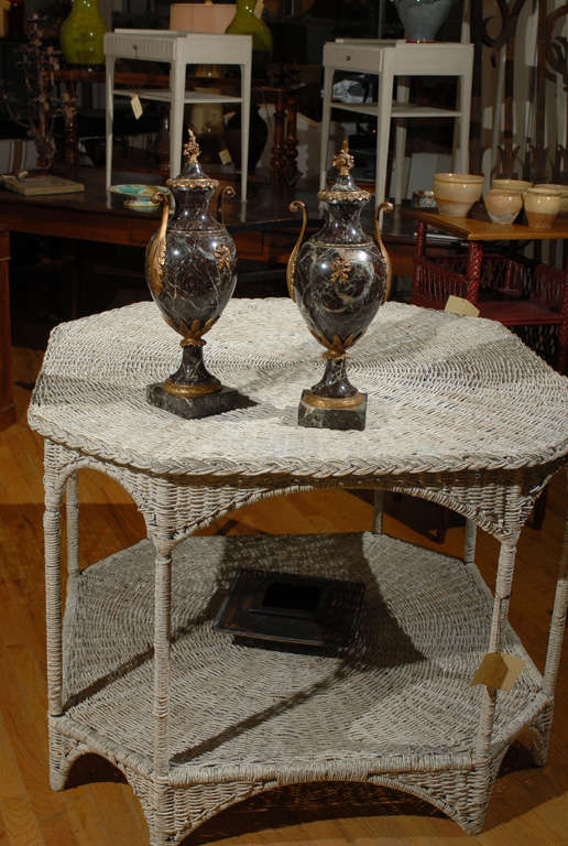 This pair of handsome marble Cassoulets has lovely bronze mountings.  The bronze mountings are delicate ribbon bows, flowers, and other beautiful details.  These cassoulets are wonderful.

Please visit our website for more
