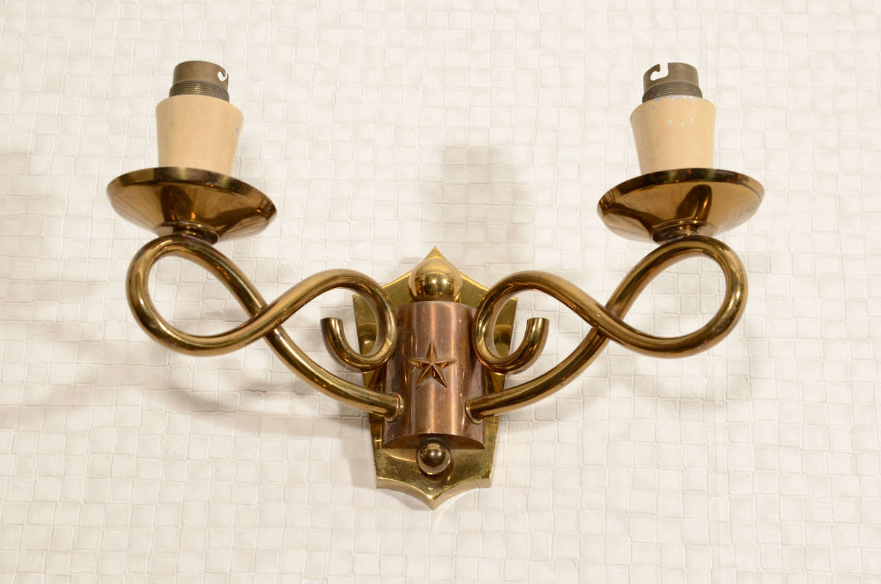 Pair of sconces in the 1940's style made in the manner of Raymond Subes. 

Original condition (French electrical standards)