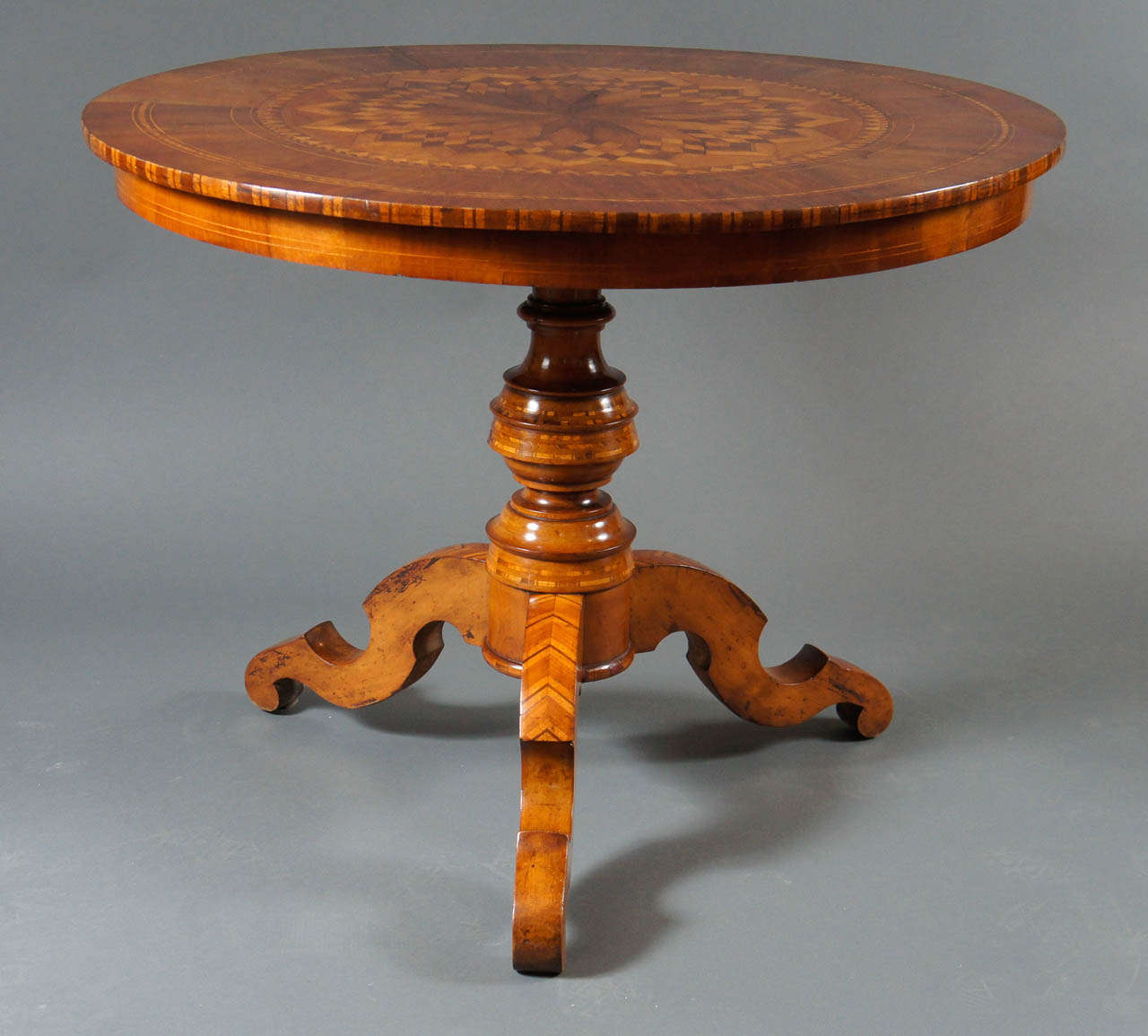 Single centre table with marquetry.