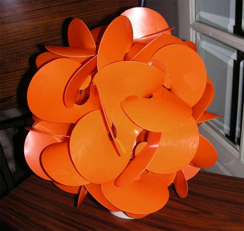 1970s orange plastic lamp by Raoul Raba, signed on one of the leaves.