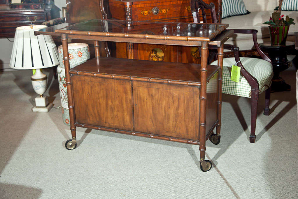 Baker Rolling Bar ... Two pull out trays with mica tops in faux bamboo motif