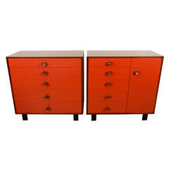 Two coordinating George Nelson dressers with red fronts