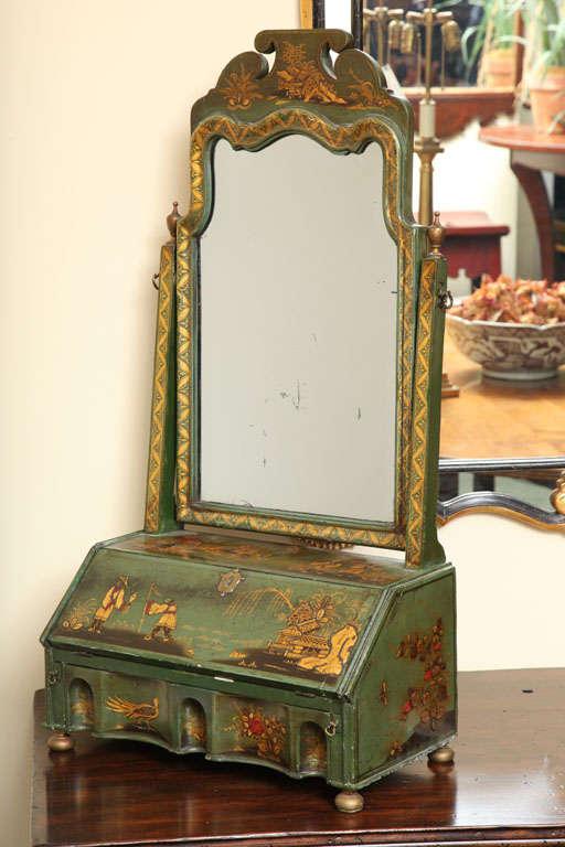 19th Century or earlier green chinoiserie dressing table mirror, with fitted interior, and secret compartment.