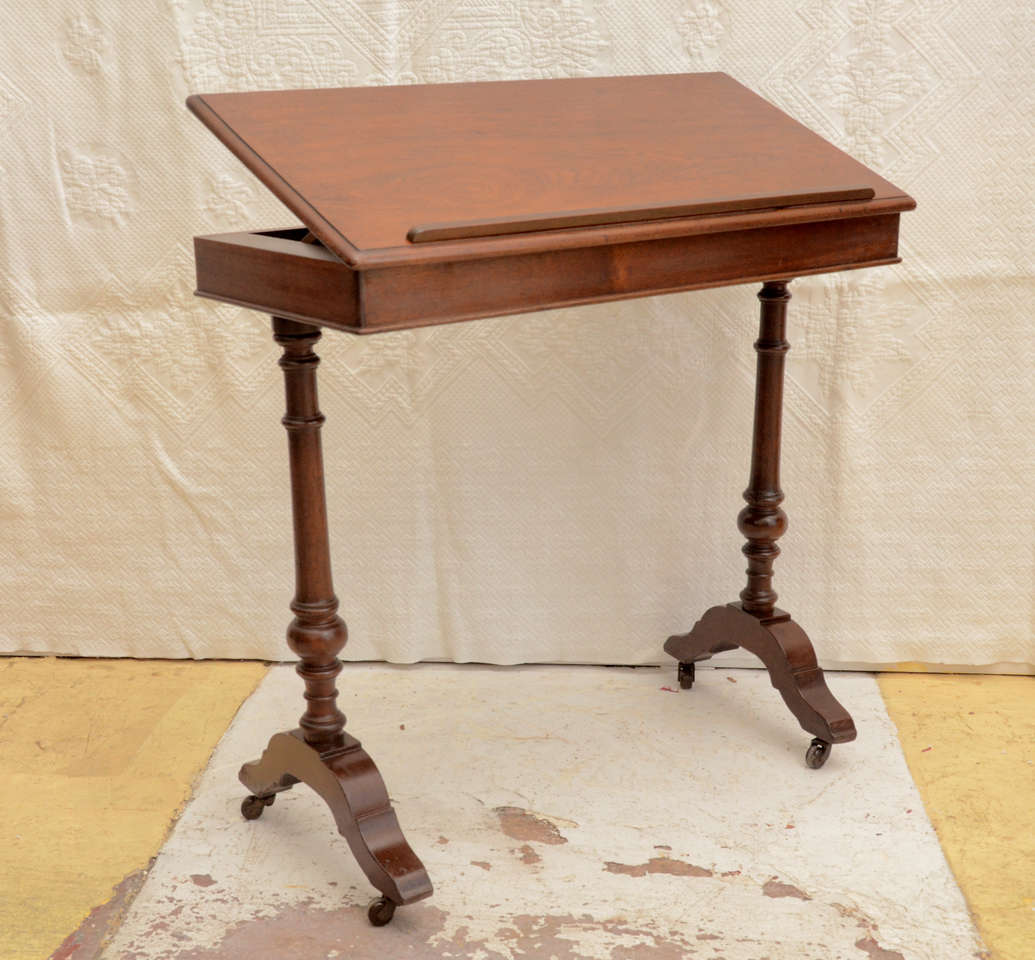 ENGLISH VICTORIAN WALNUT ADJUSTABLE RATCHET TOP READING TABLE ON CASTORS--GREAT FOR END TABLE --SM. CONSOLE OR TO DISPLAY BOOKS. BOOK REST BAR COMES OFF IF A FLAT TOP IS DESIRED