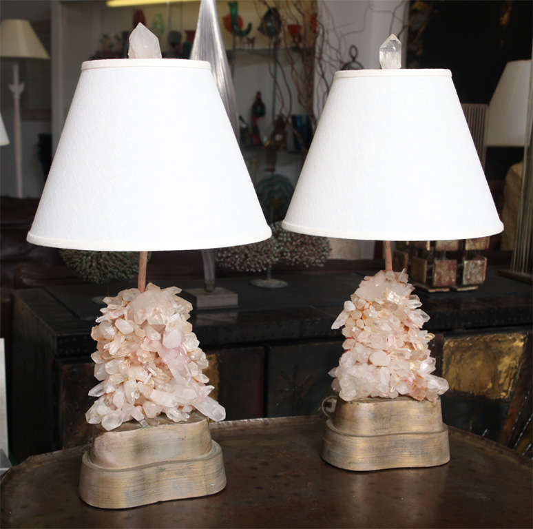 Pair of Rock Crystal lamps designed by Carol Stupell.<br />
I have the original shade that match the shape of the<br />
gilt wood base's(see photo).
