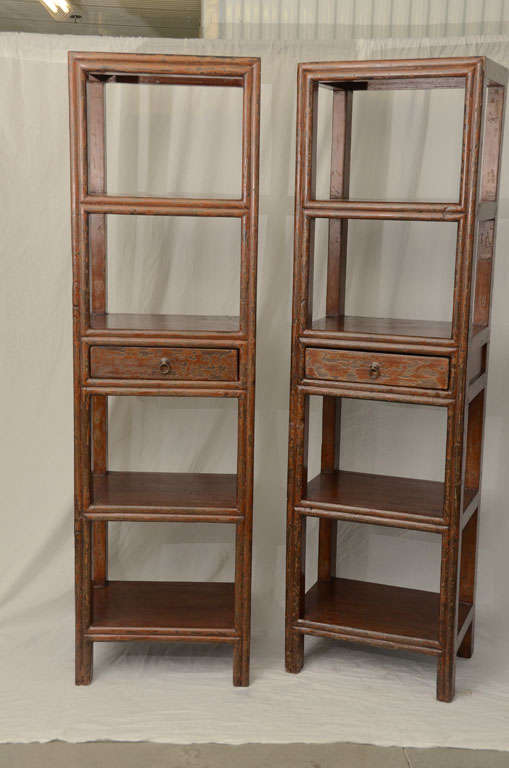 Pair of late 19th century Q'ing Dynasty open bookcase with brass hardware (one available.)