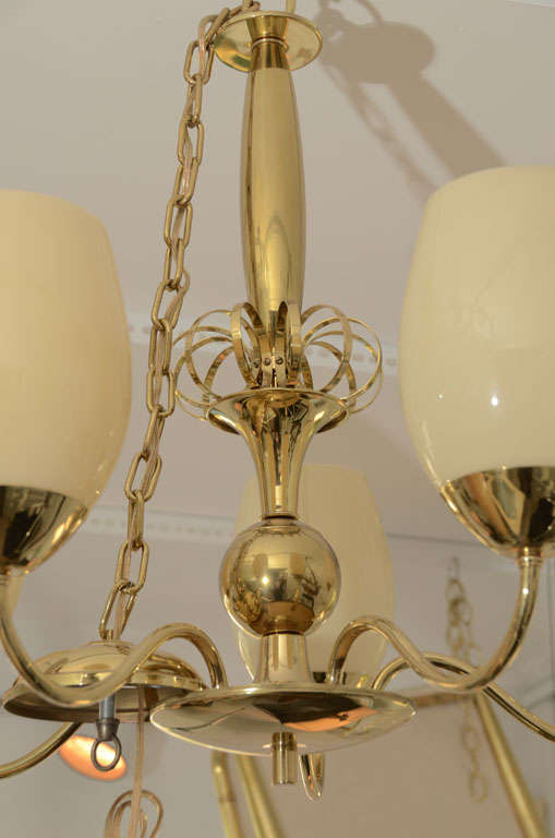 Mid-Century Modern Five-Arm Brass Chandelier with Opaque Glass Globes For Sale