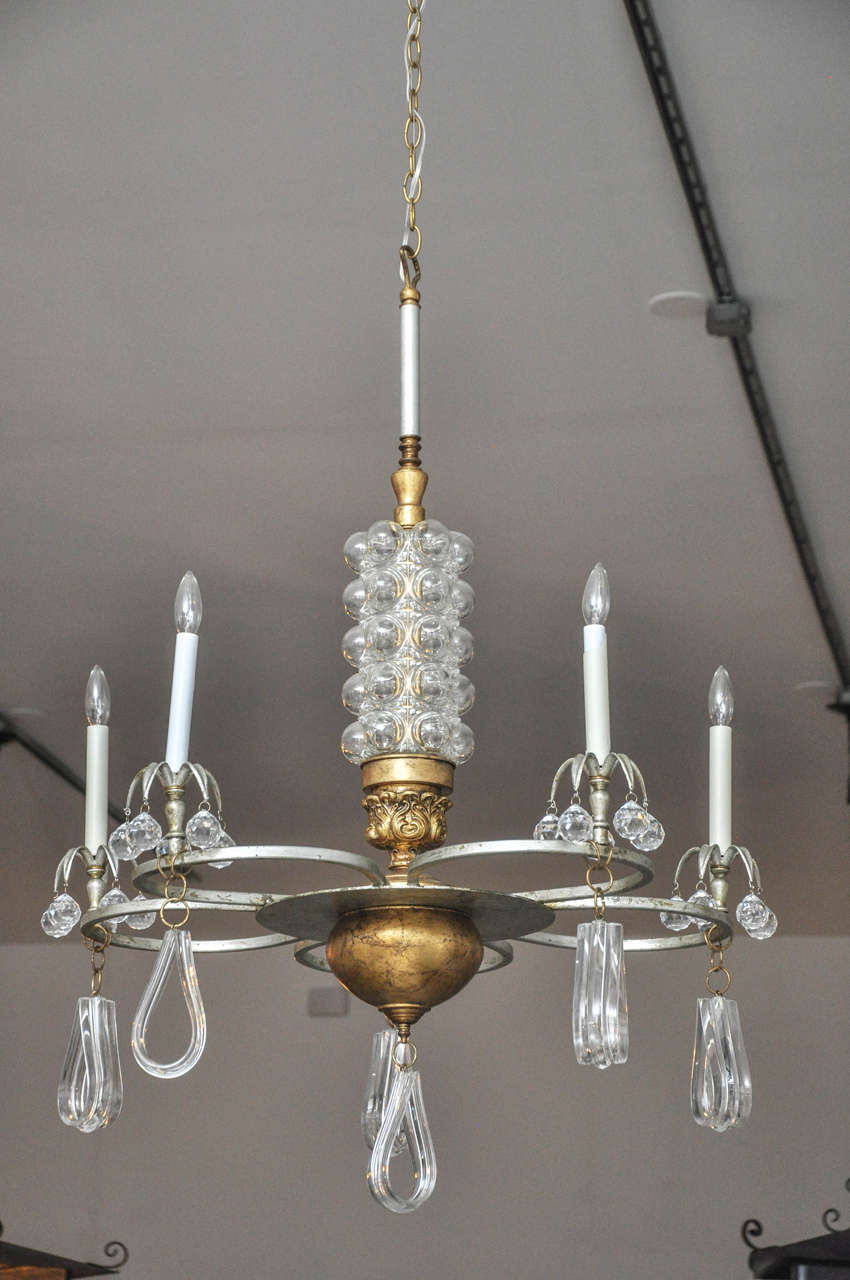 Stunningly gorgeous chandelier featuring mid-century german bubble glass. The prisms and drops are from vintage lucite chandeliers.