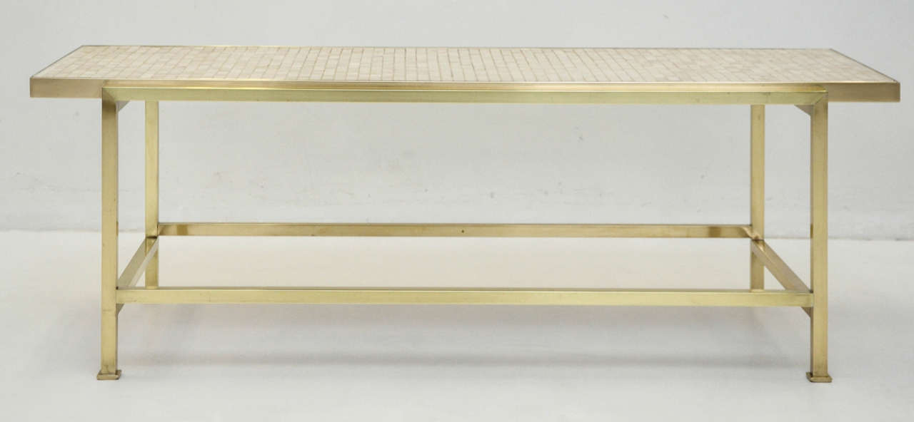 Brass frame coffee table with mosaic travertine top. Designed by Edward Wormley for Dunbar.