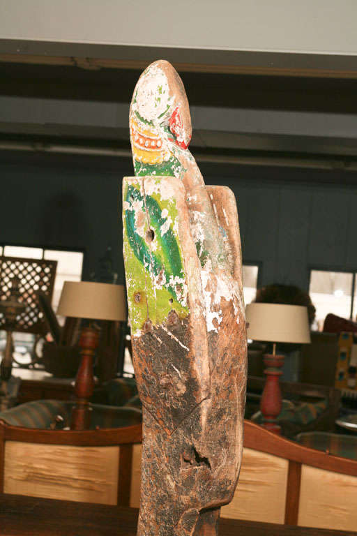 Antique carved and decorated ship's figurehead, circa 1890, depicting a regal bird with a beak. The sculpture is in original paint. Although there has been much paint loss and age cracks, they all contribute to the charm of this rare and unusual