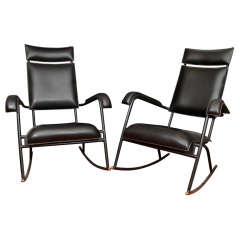 Rare Pair of Jacques Adnet Rocking Chairs